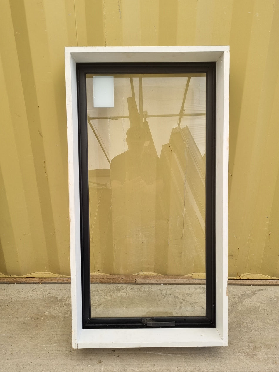 Recycled Black Aluminium Window with an awning opening sash. Size: 560 mm Wide x 1060 mm High.