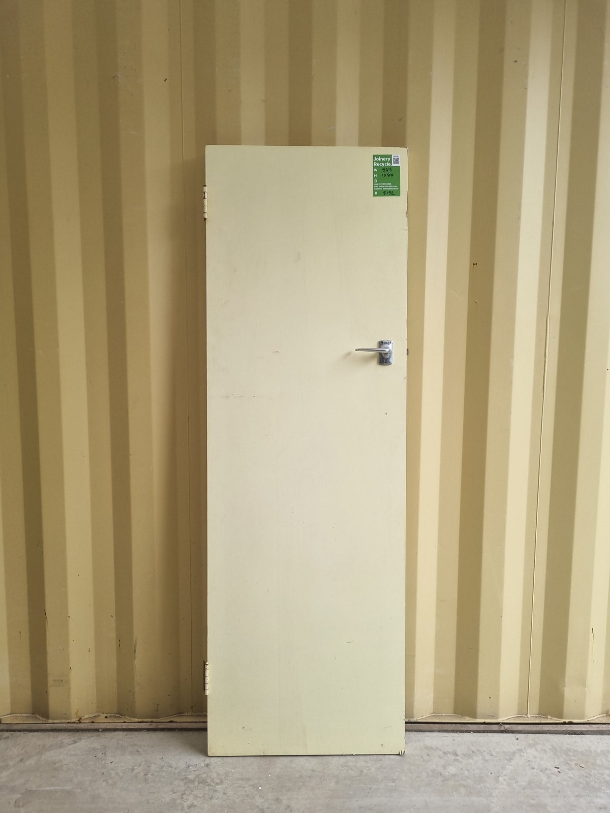 Secondhand hollowcore internal door made of timber (not mdf) with antique chrome lever door handle. Narrow width would suit a cupboard or wardrobe